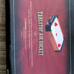 Tabletop air hockey